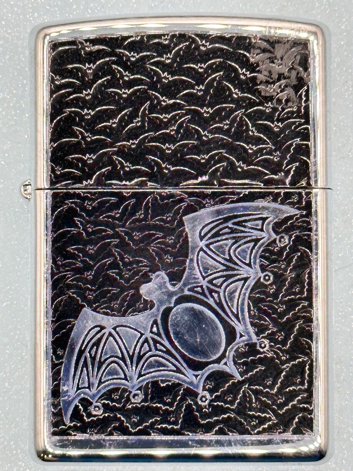 Vintage 2007 Flocking Bat High Polish Chrome Zippo Lighter NEW