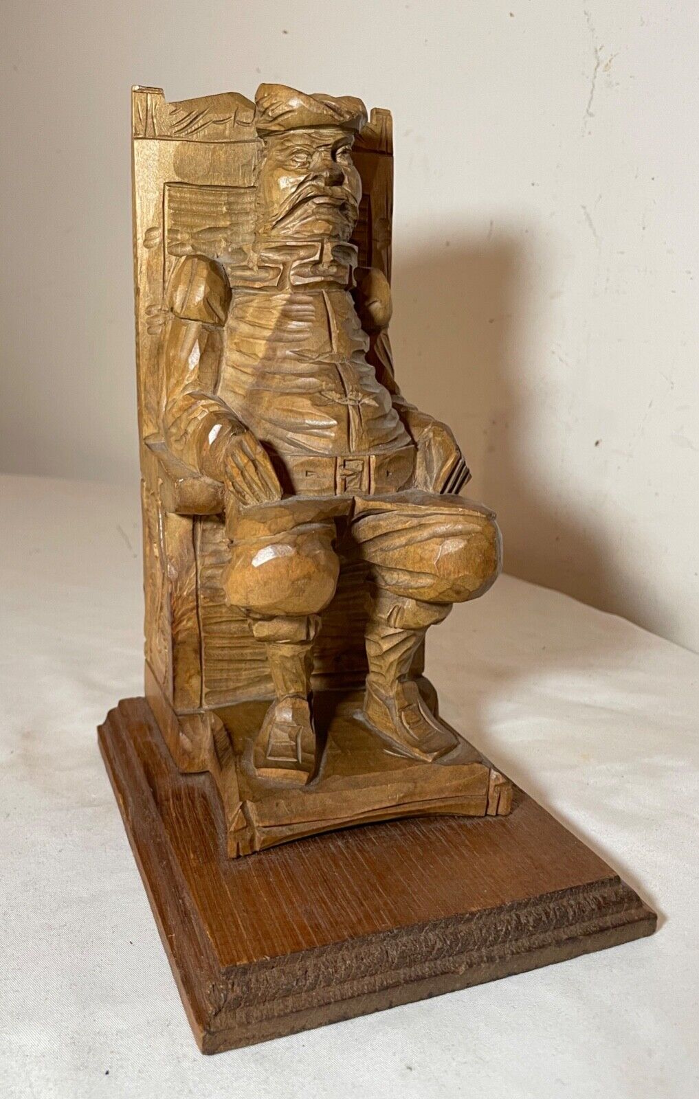 antique hand carved seated figural seated man wood sculpture statue folk art .