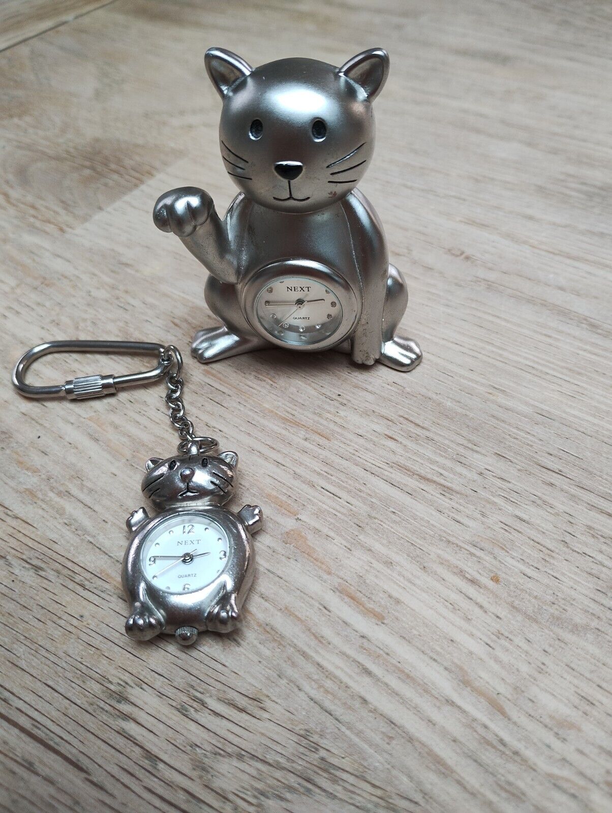miniature stainless steel cat clock and keyring clock by next