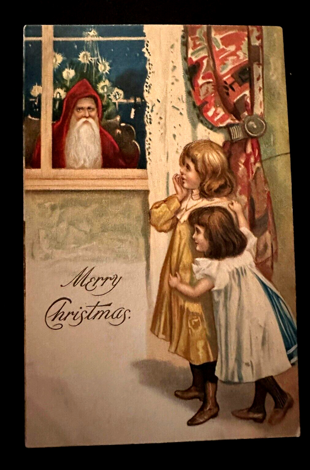 Hooded~Santa Claus Peeks in Window~Children Look~Antique Christmas~Postcard~k645