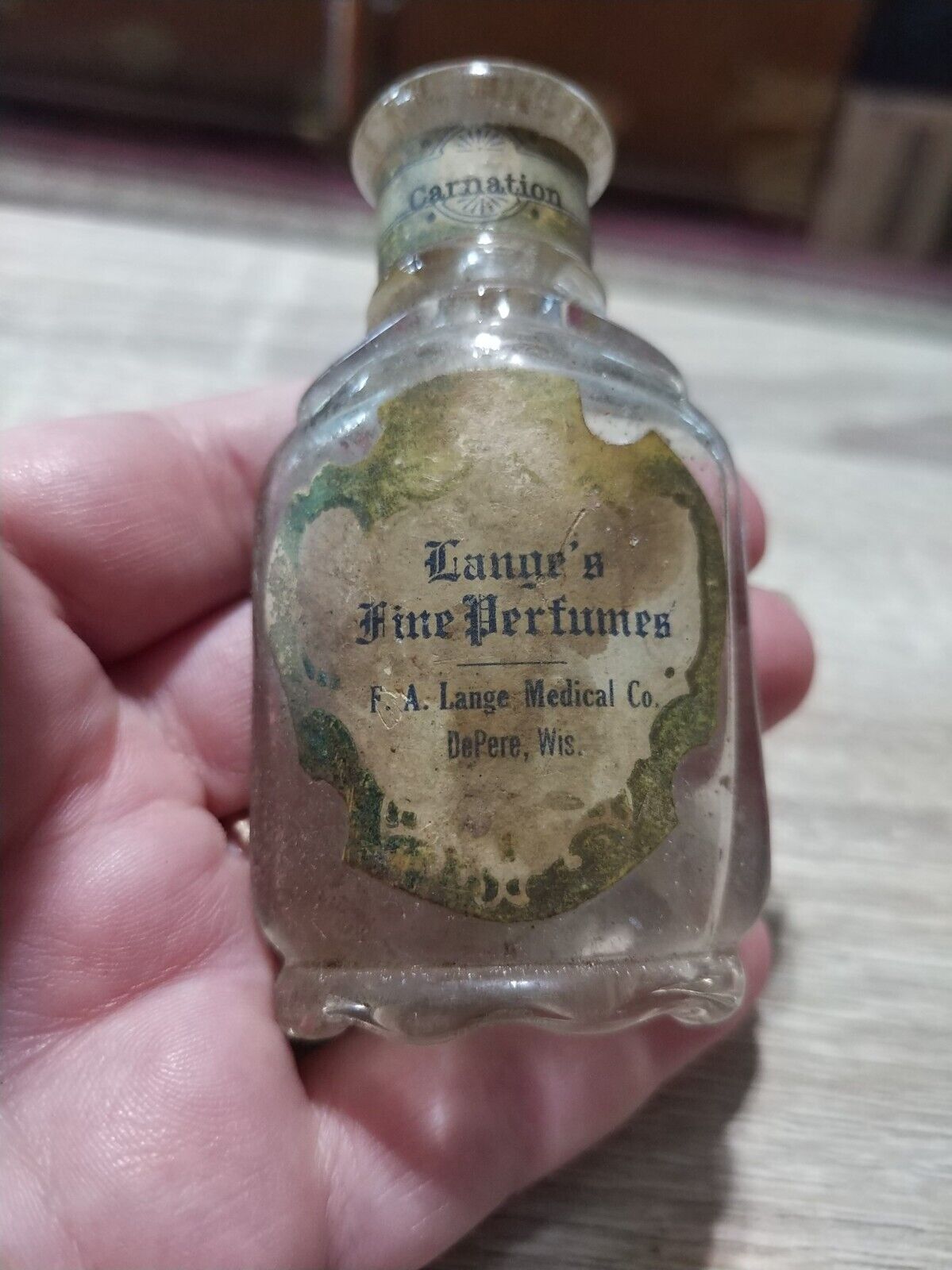 Antique Lange\'s fine perfumes bottle. F.A Lange medical Co. DePere WI. Carnation