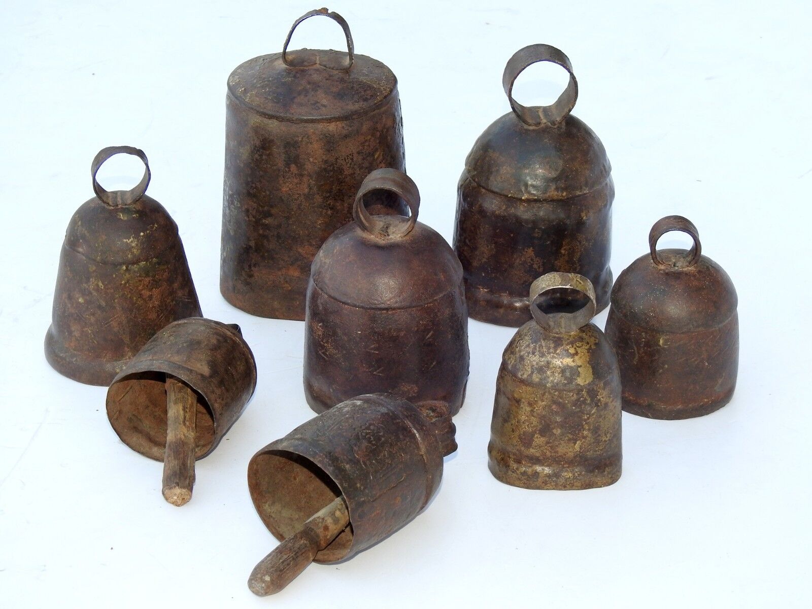 Lot of 25 Antique 1900\'S Vintage Metal Cow Bell Hand Carved Collectible Art