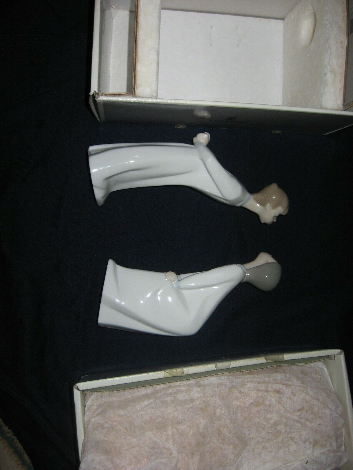 Lladro “Girl blowing kiss” and “Boy blowing kiss” figurines #4873,  #4869 