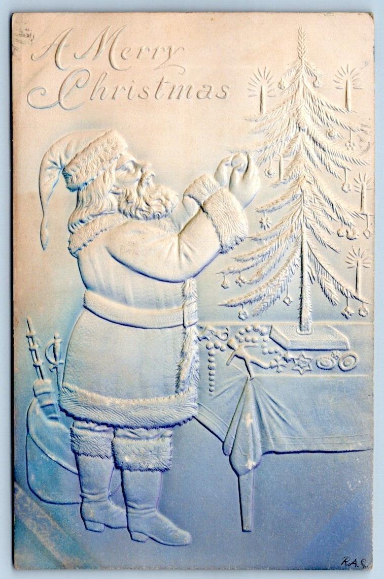 1906 A MERRY CHRISTMAS*EMBOSSED SANTA CLAUS TRIMMING TREE*BLUE WHITE OMBRE