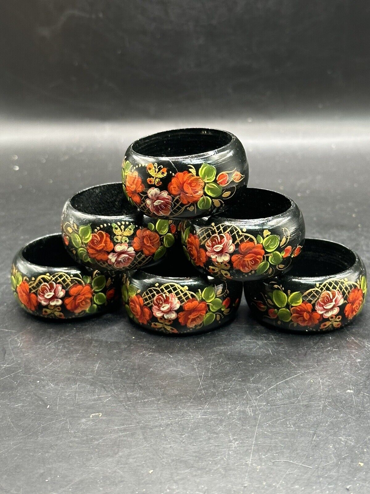 Handpainted black lacquer napkin rings (6)