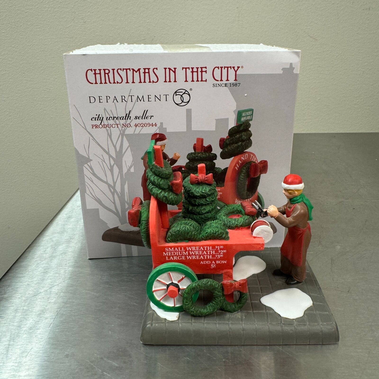Department 56 City Wreath Seller #4020944 Christmas in the City Figurine OOP