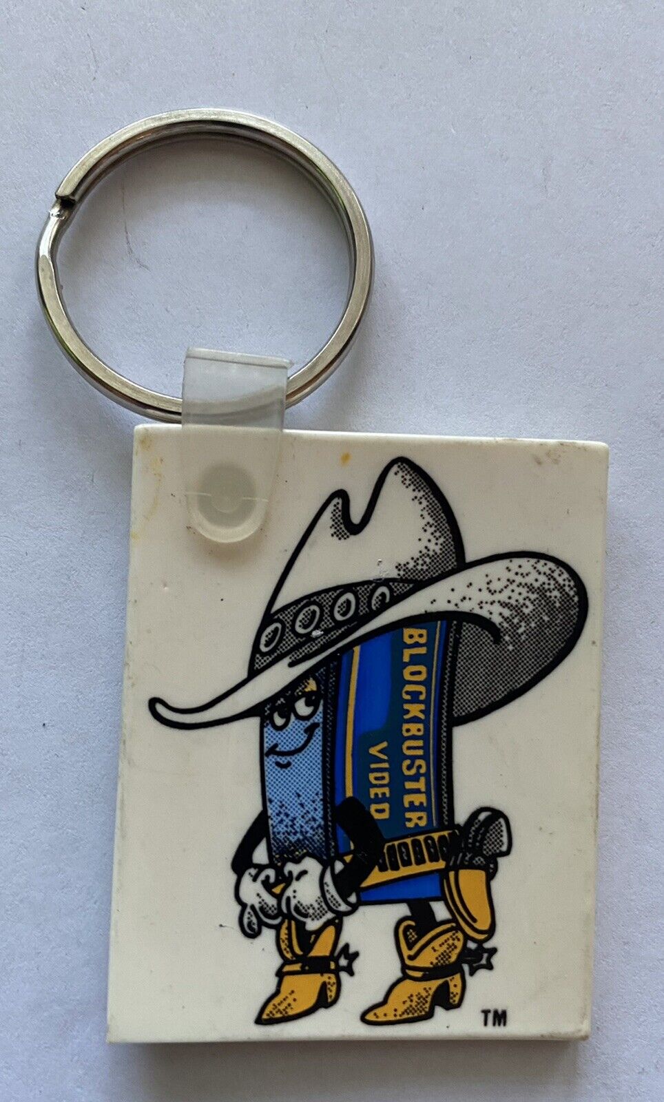 Blockbuster Video Cowboy Vtg Plastic Keychain Fob RARE Rental Tape Cowboy 1990s