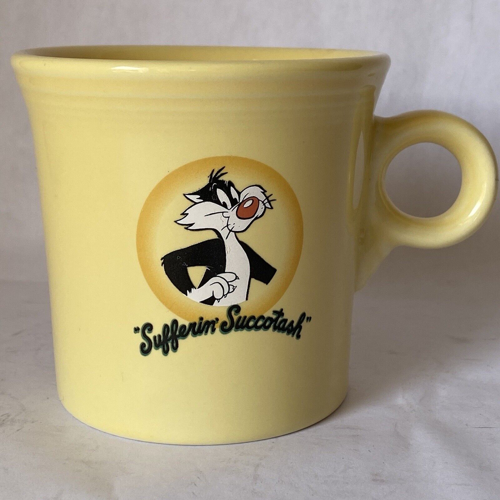 Warner Brothers Looney Tunes Fiestaware Yellow Sylvester Coffee Mug 1994 EUC