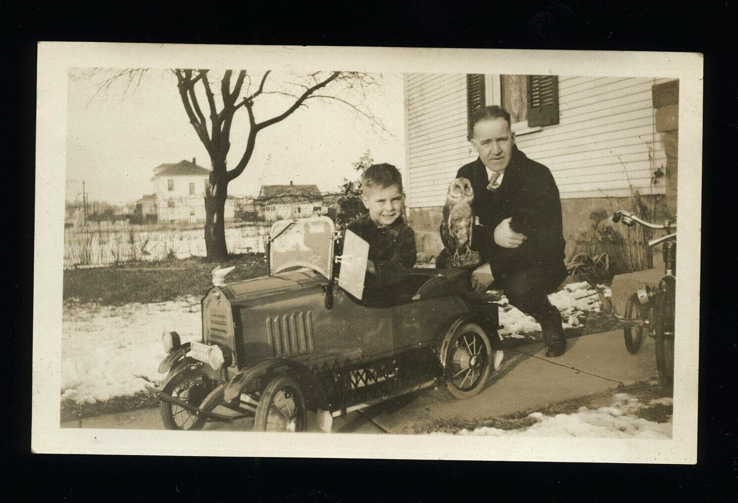 BOY DRIVING TOY PEDAL DERBY CAR WITH WEIRD OWL ON TRUNK 1920s VTG ANTIQUE PHOTO
