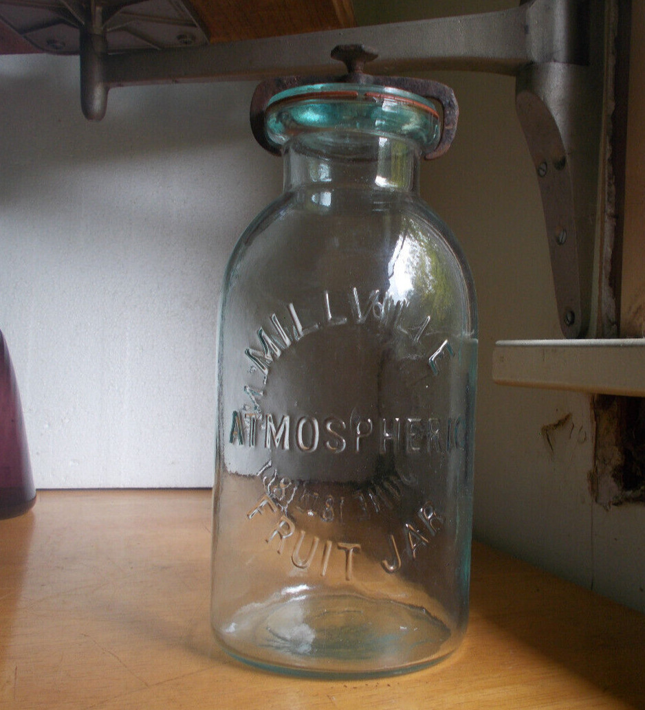1/2 GALLON MILLVILLE ATMOSPHERIC FRUIT JAR WITH ORIGINAL CLAMP & 1861 GLASS LID