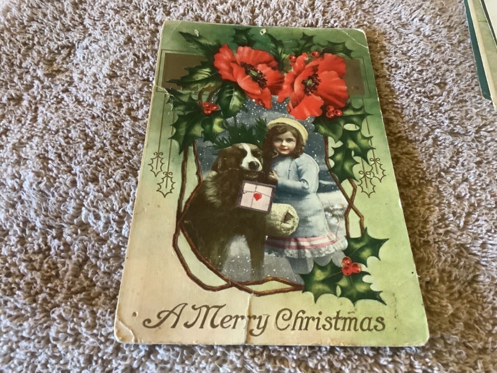 VINTAGE 1914 MERRY CHRISTMAS GIRL WITH A DOG EMBOSSED POSTCARD