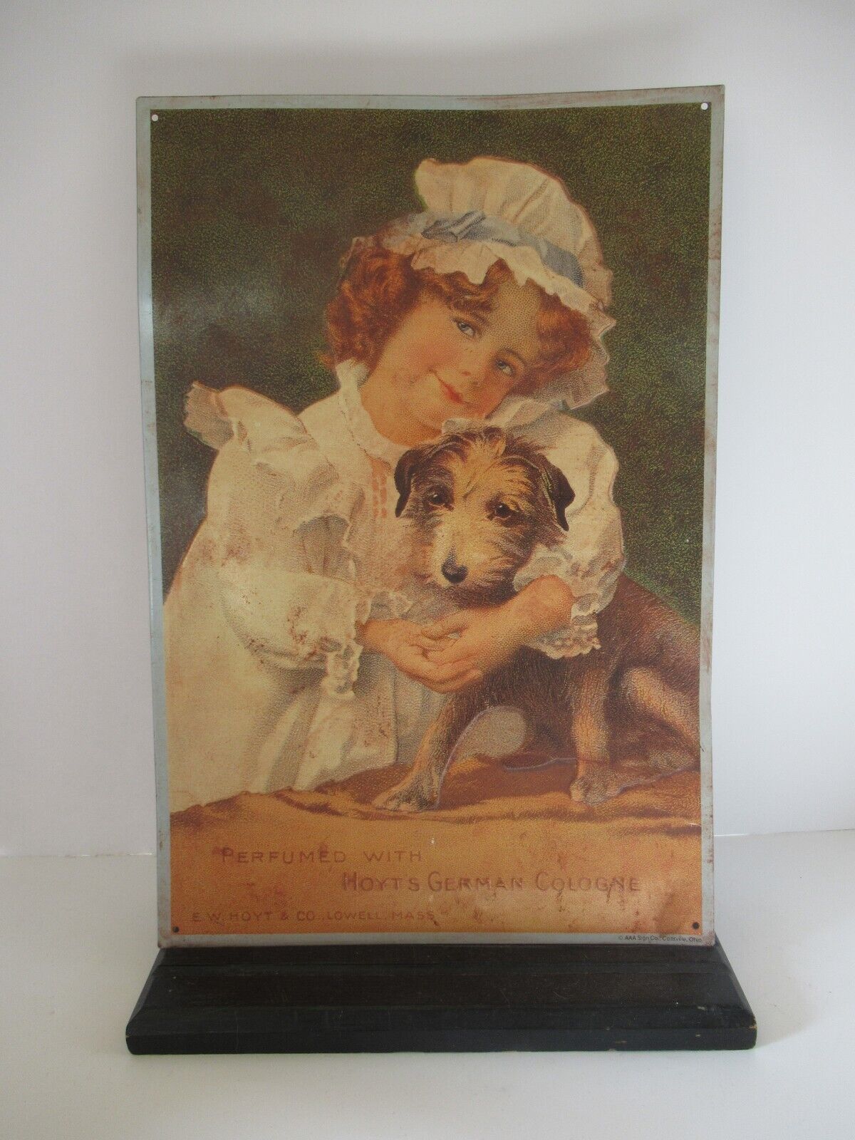 Vintage pressed tin advertising sign Hoyt\'s German Cologne Girl w puppy 16 x 11