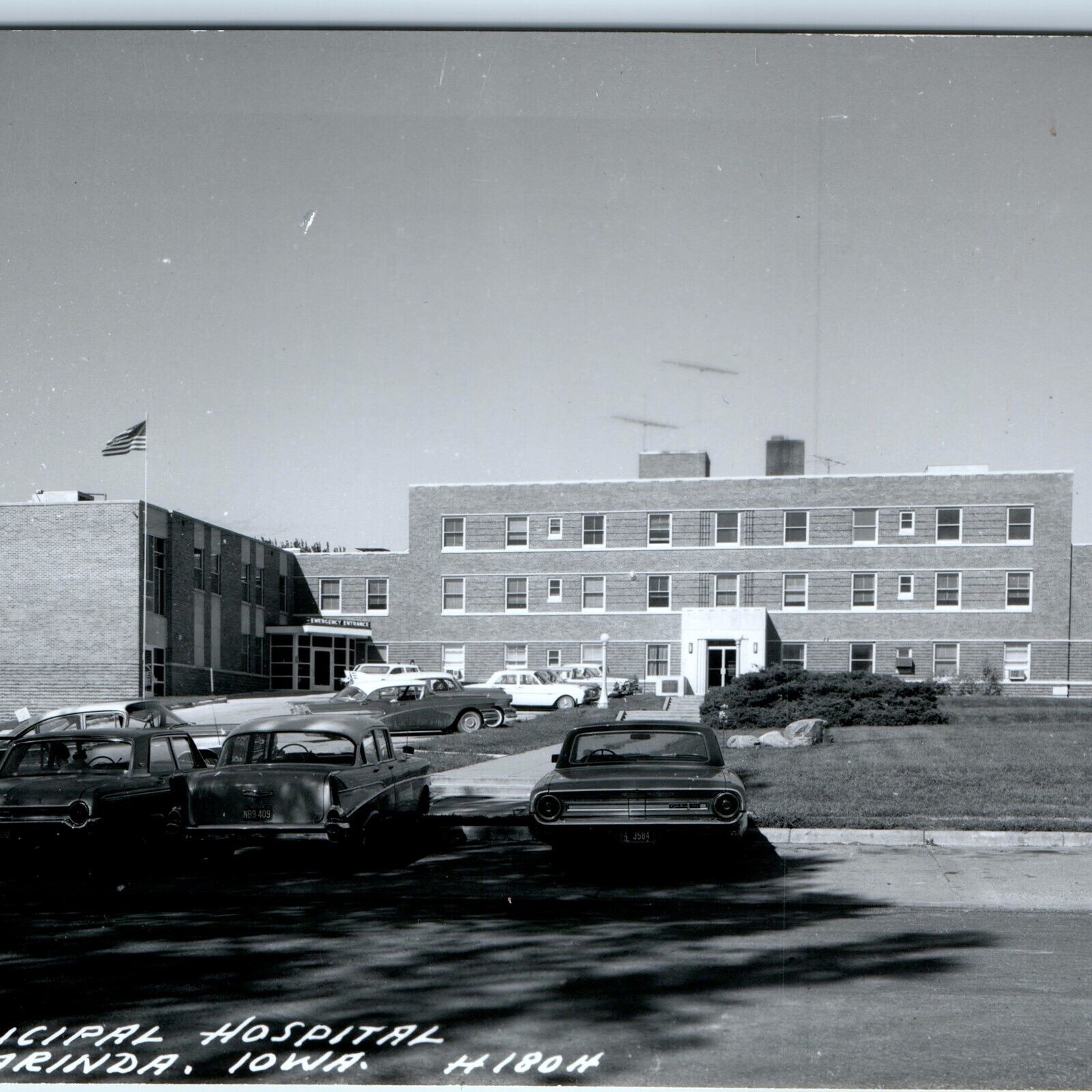 c1960s Clarinda, IA RPPC Municipal Hospital Real Photo Ford Cars Postcard A103