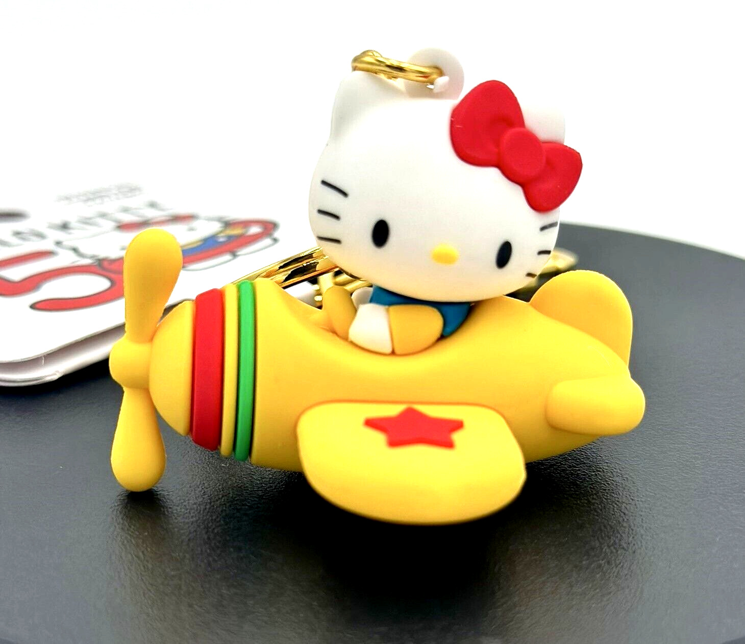 Loungefly Sanrio Hello Kitty (yellow airplane) 50th Anniversary Keychain