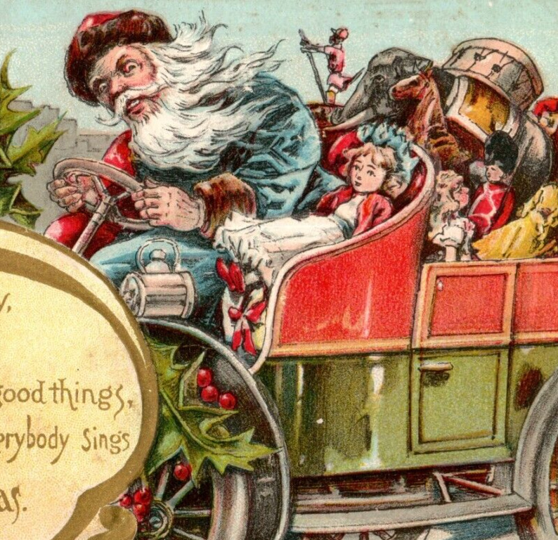 c.1907 Blue Robe Coat Santa Claus Driving Car Full of Toys Christmas Postcard