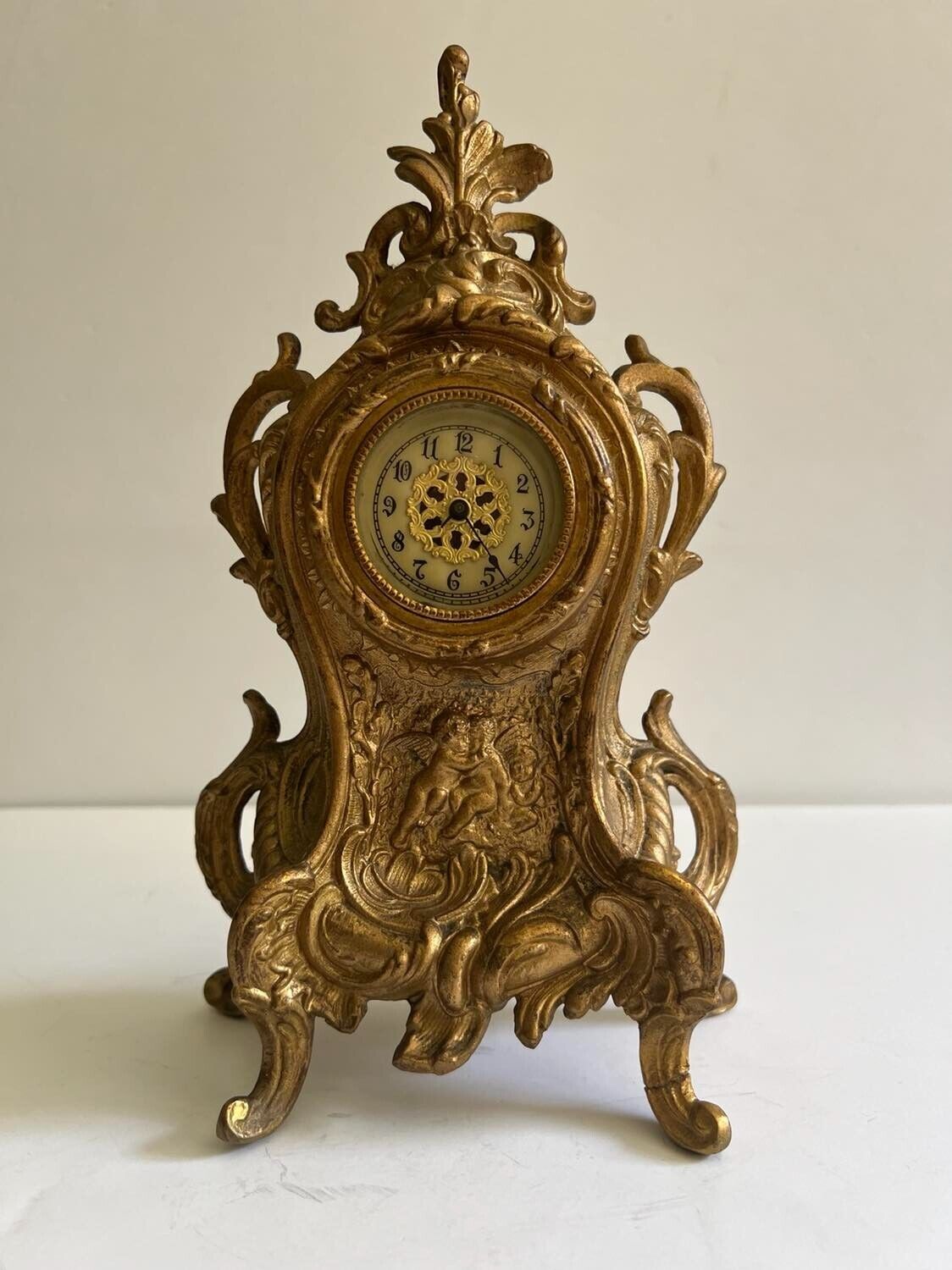 Vintage Gold Over Cast Iron Mantle Clock The clock doesn't work
