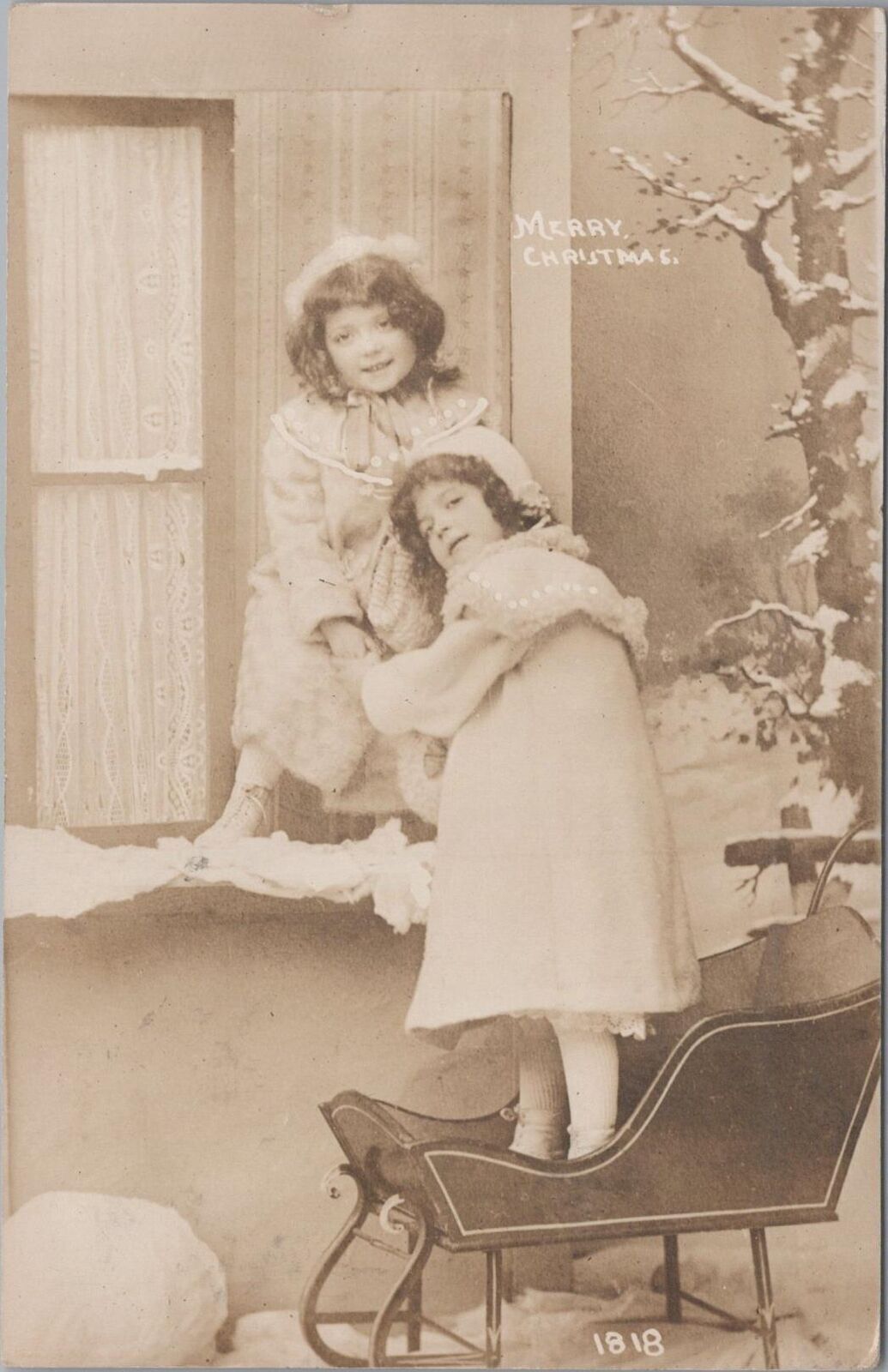 RPPC Merry Christmas Two Girls Holding Hands Standing in Sled 
