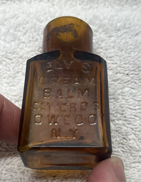 ANTIQUE AMBER MINIATURE HAY FEVER BOTTLE- OLD ELY’S CREAM BALM NEW YORK