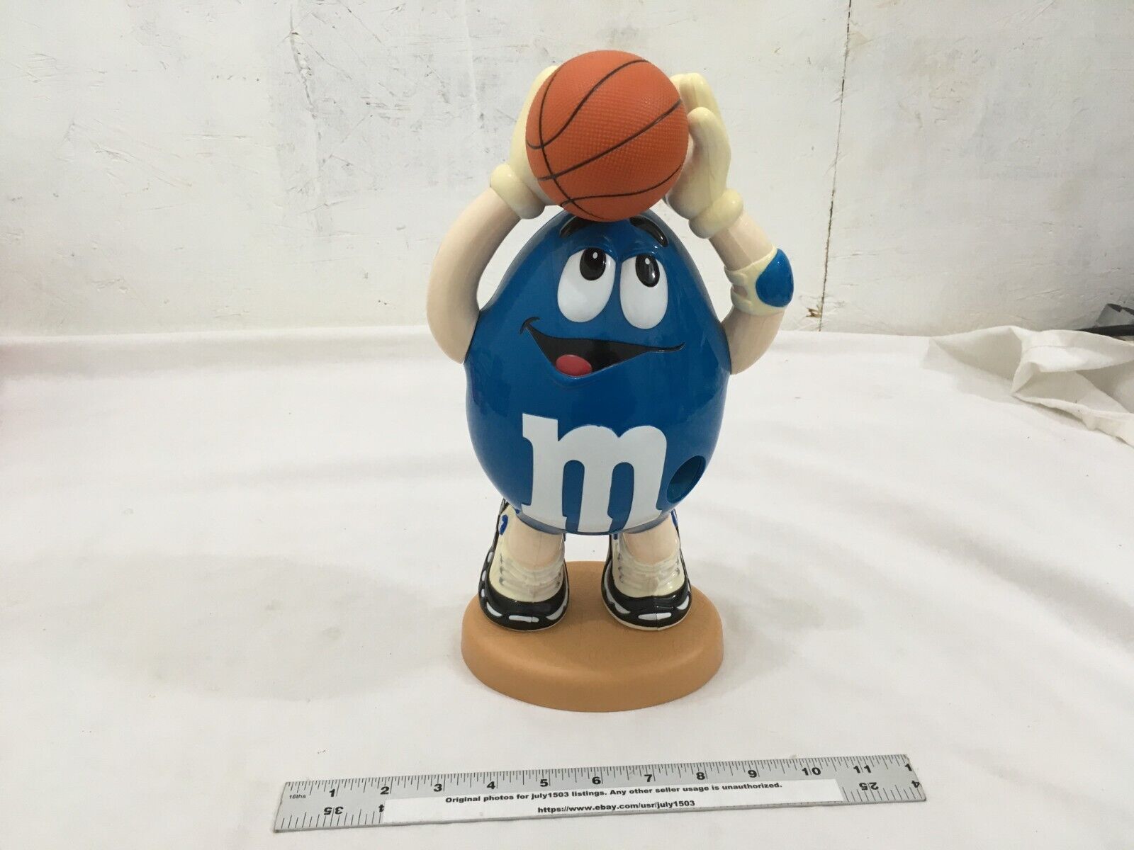(1) USED M&M Candy Dispenser - Blue Peanut as Basketball Player, Arms Raised