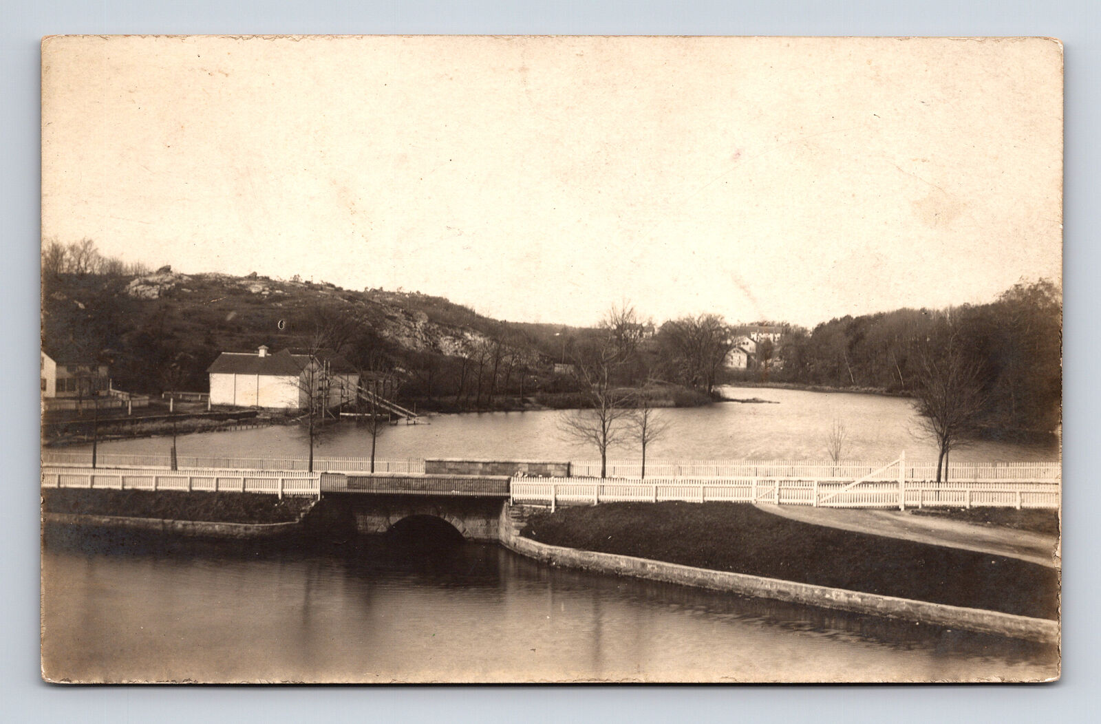 RPPC Scenic View of Unknown Lake River & Bridge Postcard