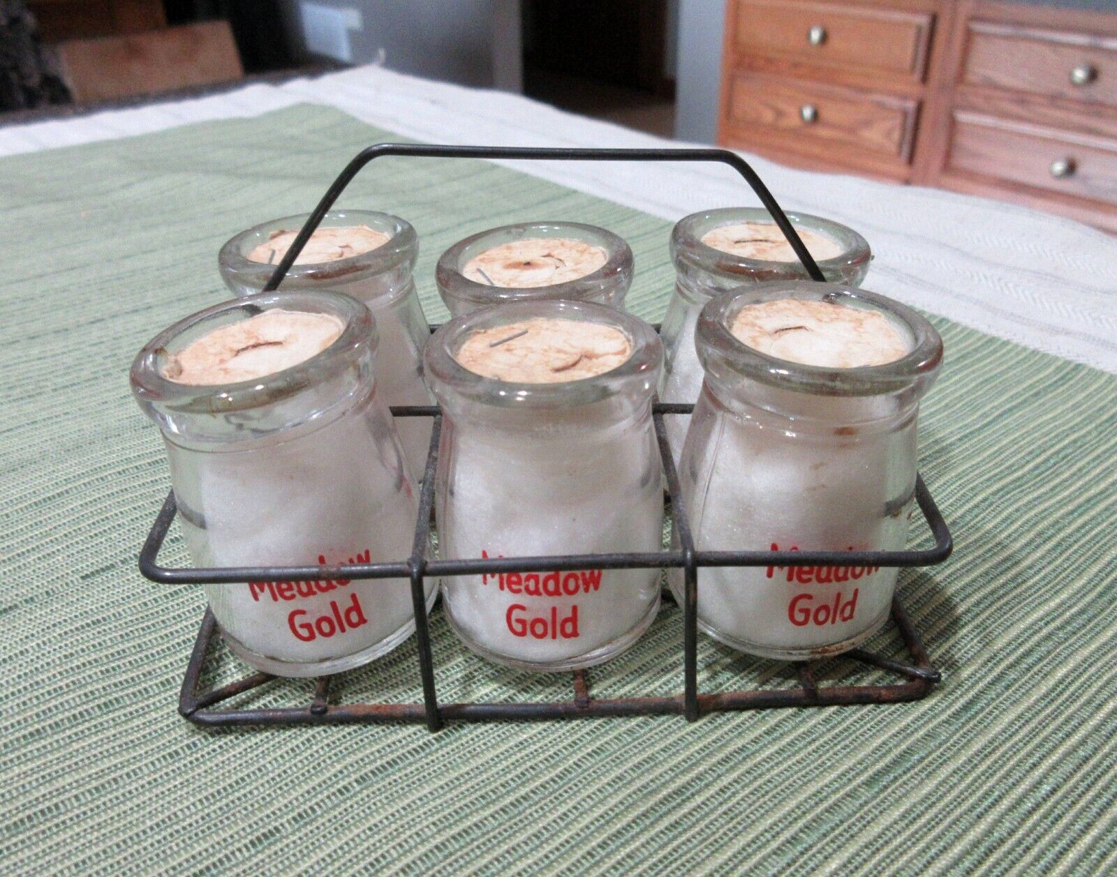 VINTAGE MEADOW GOLD DAIRY SET OF 6 MINI CREAMER BOTTLES WITH WIRE CARRIER