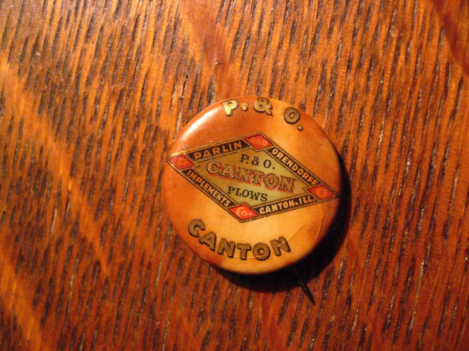 P&O Plows Lapel Pin - Vintage Parlin And Orendorff Canton Illinois USA Button