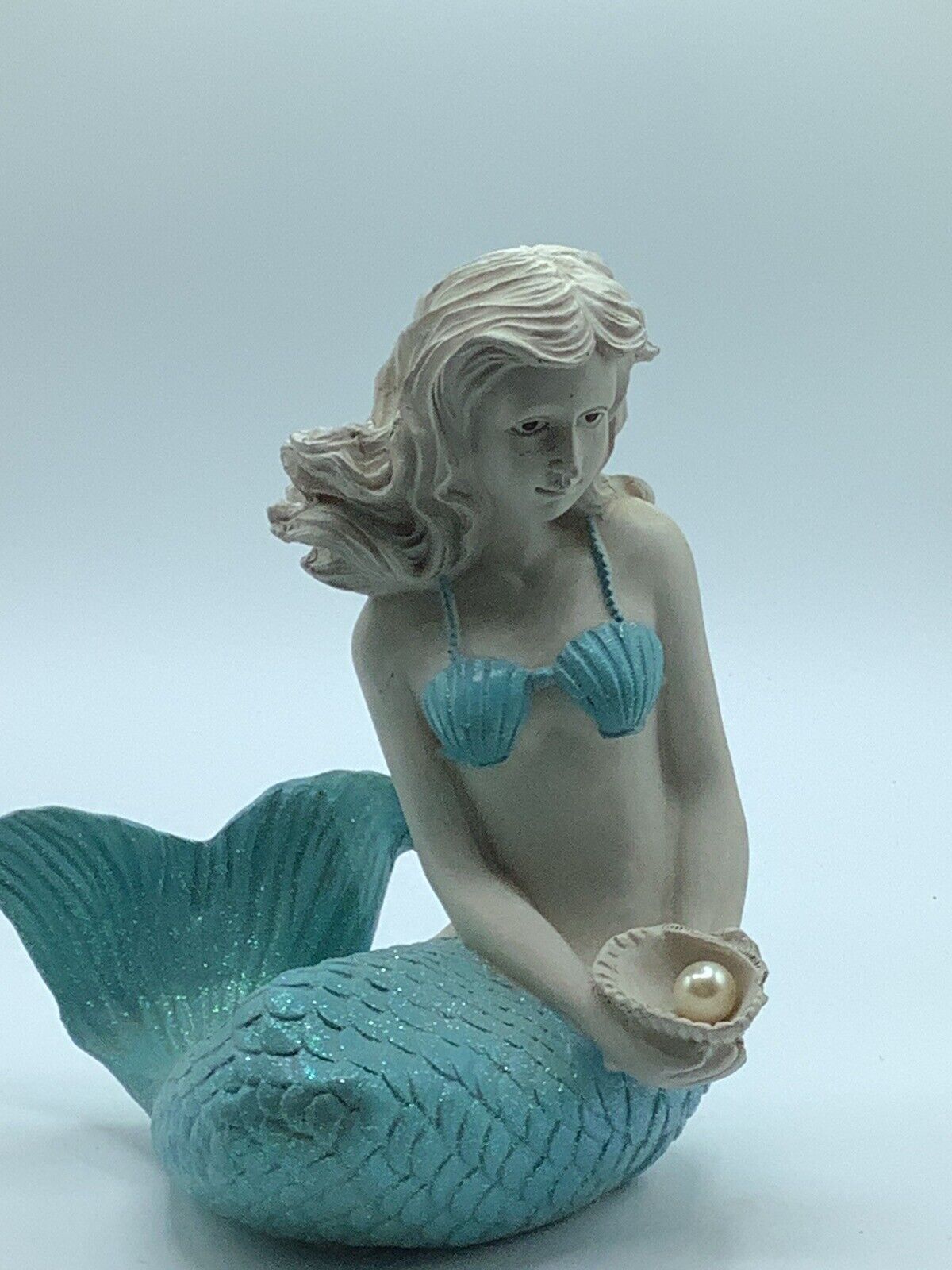8 1/2″h Blue Sitting Mermaid Figure Cold Cast Resin Holding Shell With Pearl