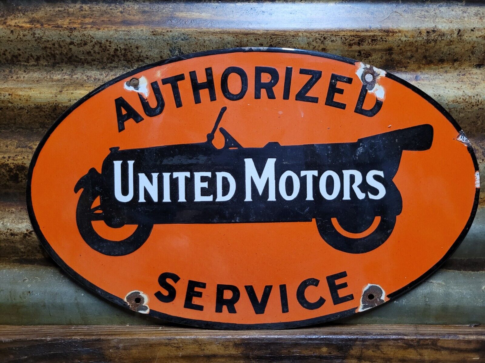 VINTAGE UNITED MOTORS PORCELAIN SIGN AUTHORIZED AUTOMOBILE SERVICE STATION OVAL