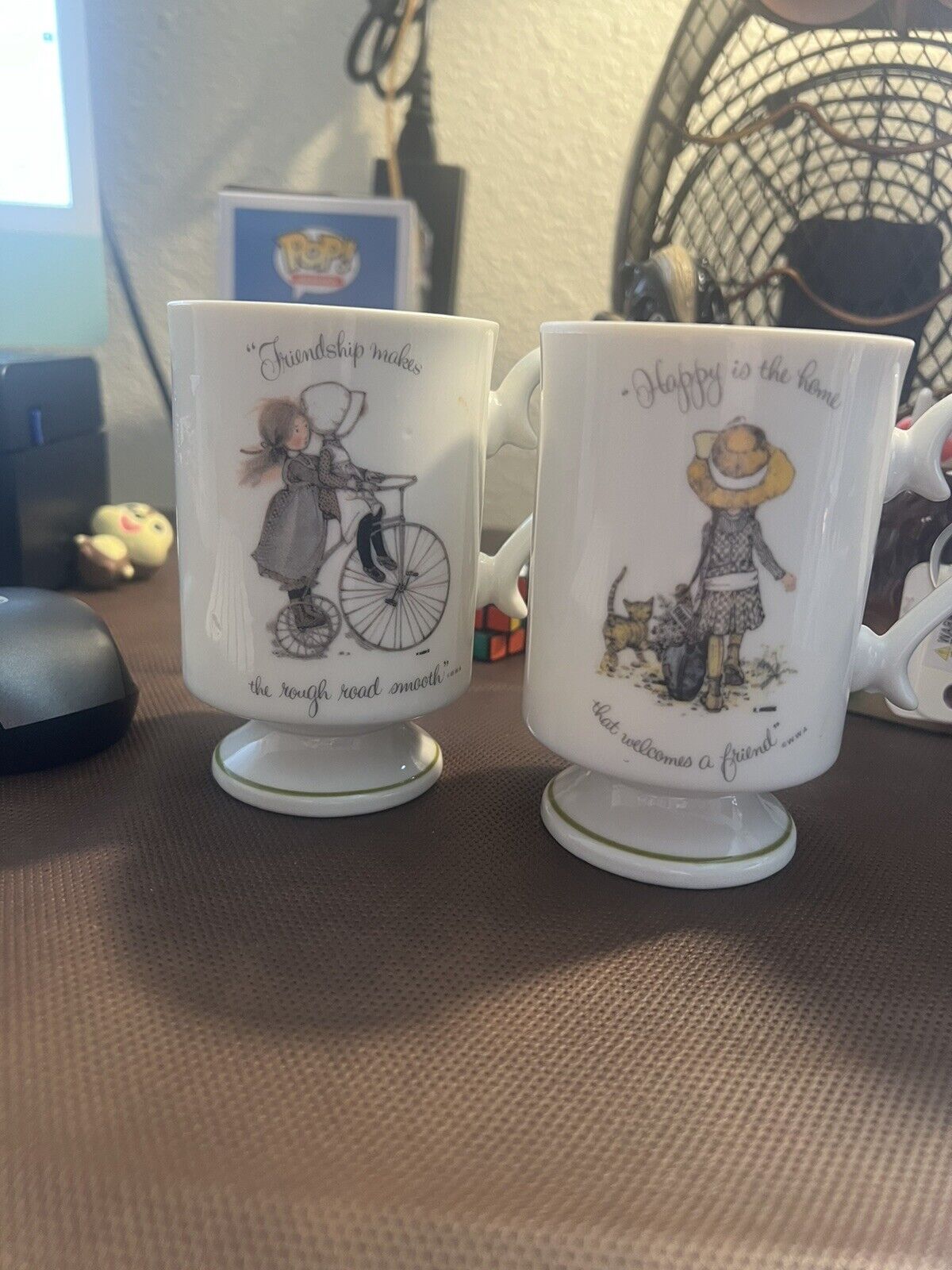 pair of holly Hobbie  mugs, porcelain