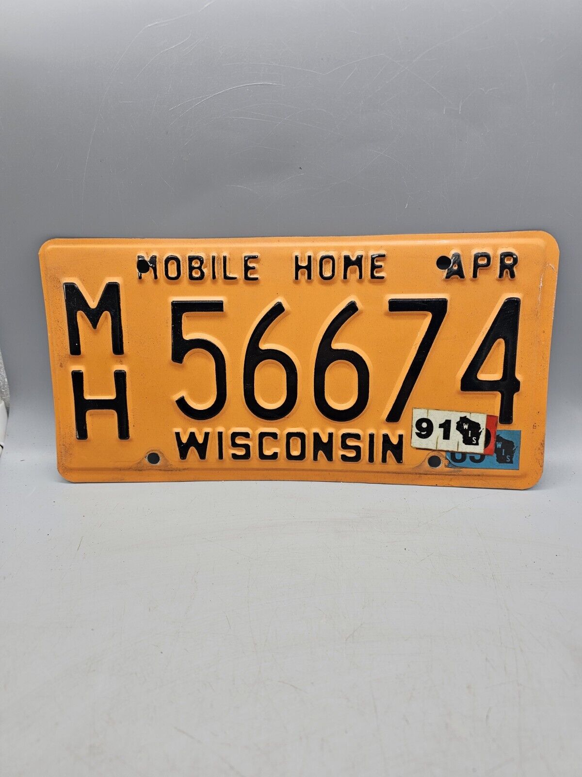 1991 Wisconsin Mobile Home Orange License Plate Craft 56674