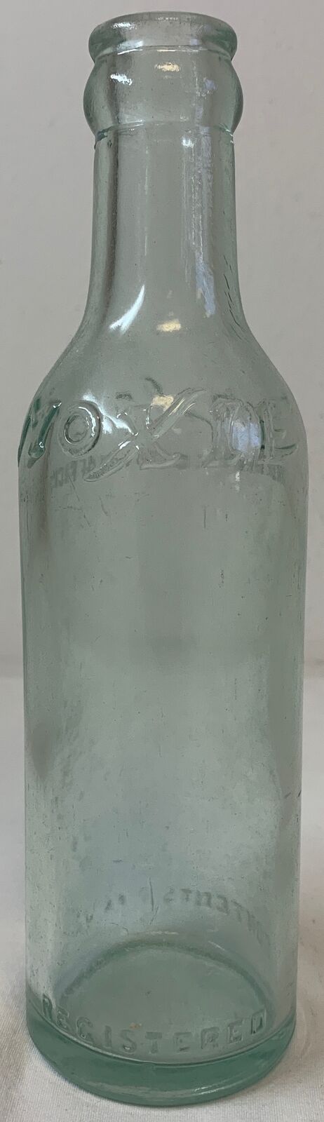 vintage 7 ounce MOXIE embossed soda bottle
