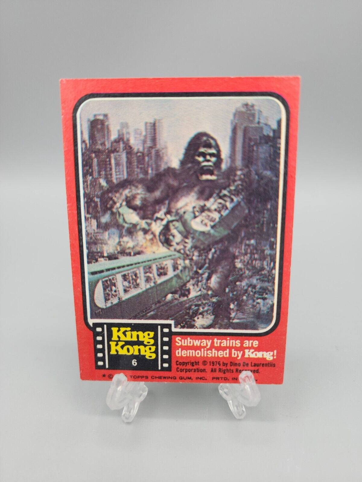 King Kong 1976 Topps #6 Subway Trains Demolished by Kong Vintage Trading Card