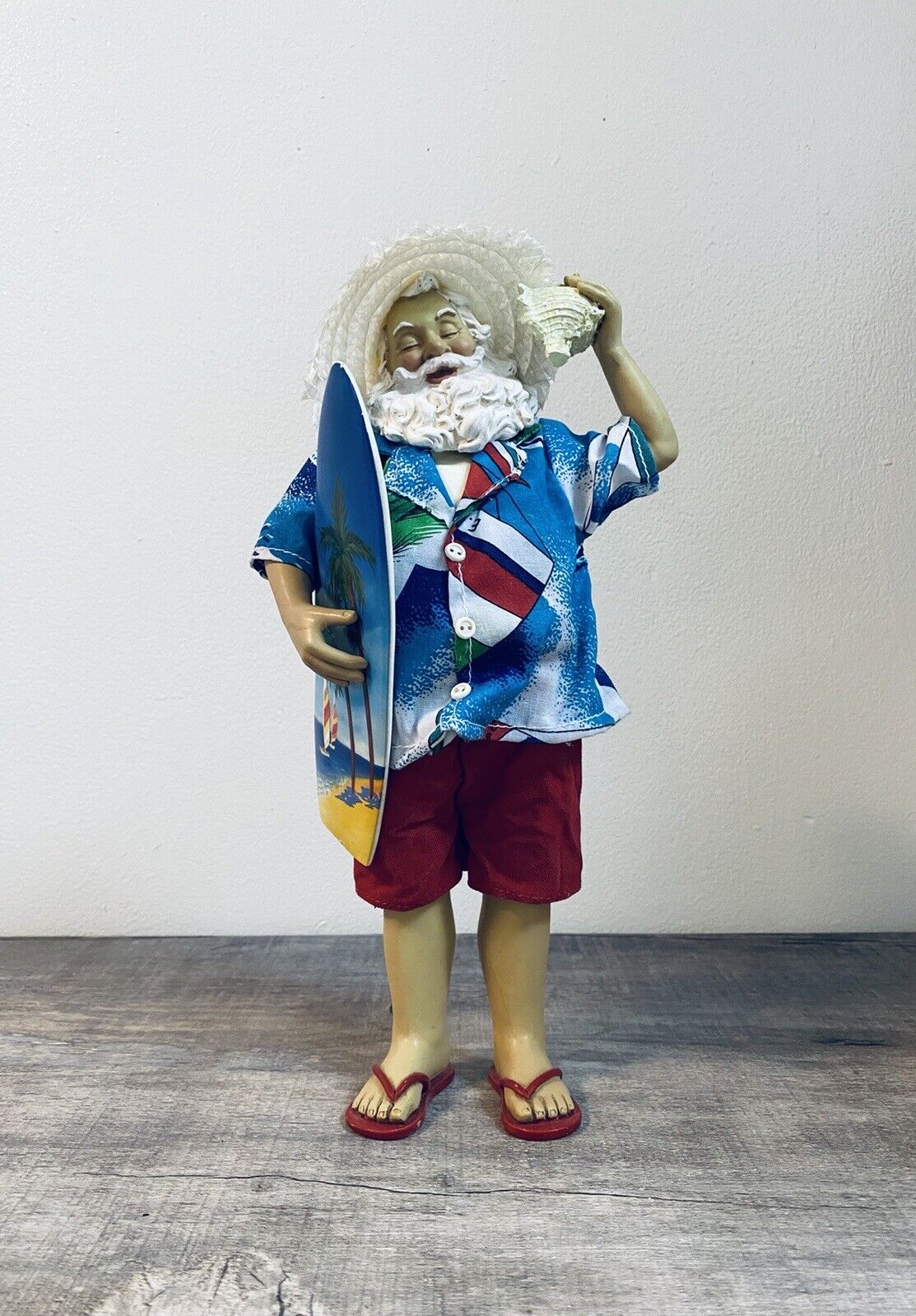 Vintage Resin and Cloth Beach Christmas Santa with Conch Shell and Surfboard 
