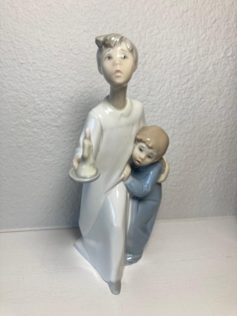 NAO by Lladro Young Man w/a Lit Candle w/Arm Around His Little Sis #4899 Retired