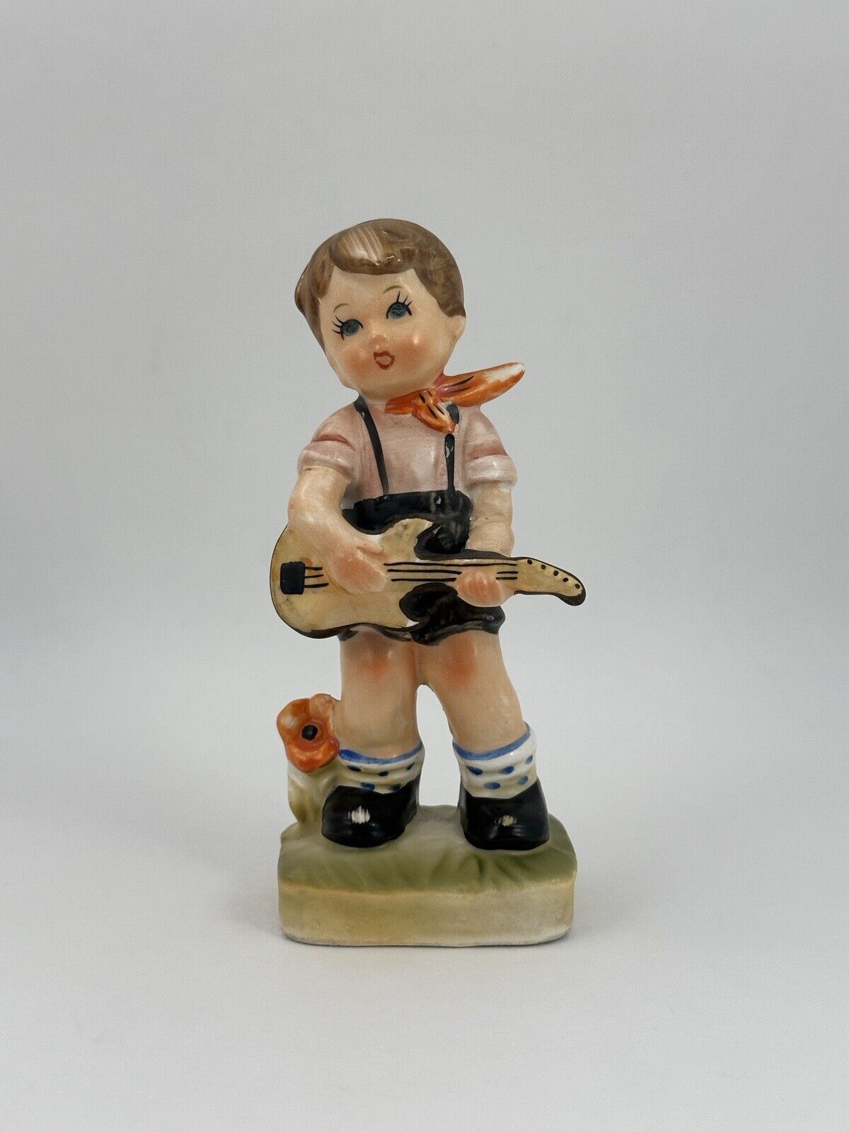 Vintage Little Boy Playing Guitar Ceramic Figurine