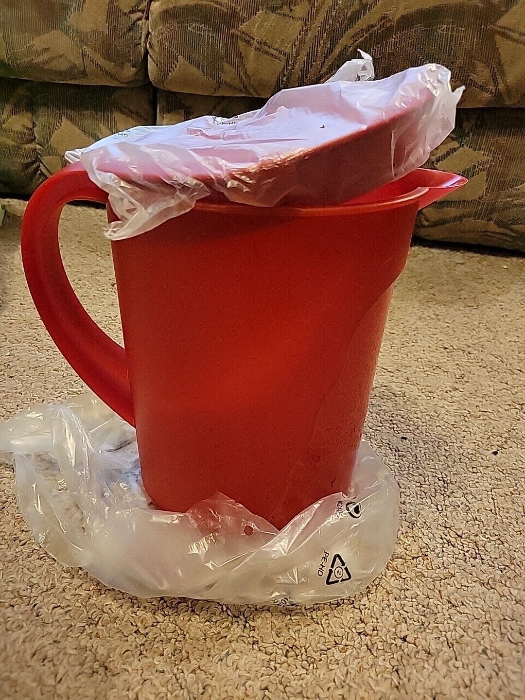 New Tupperware 1 Gal. Impressions Cranberry pitcher