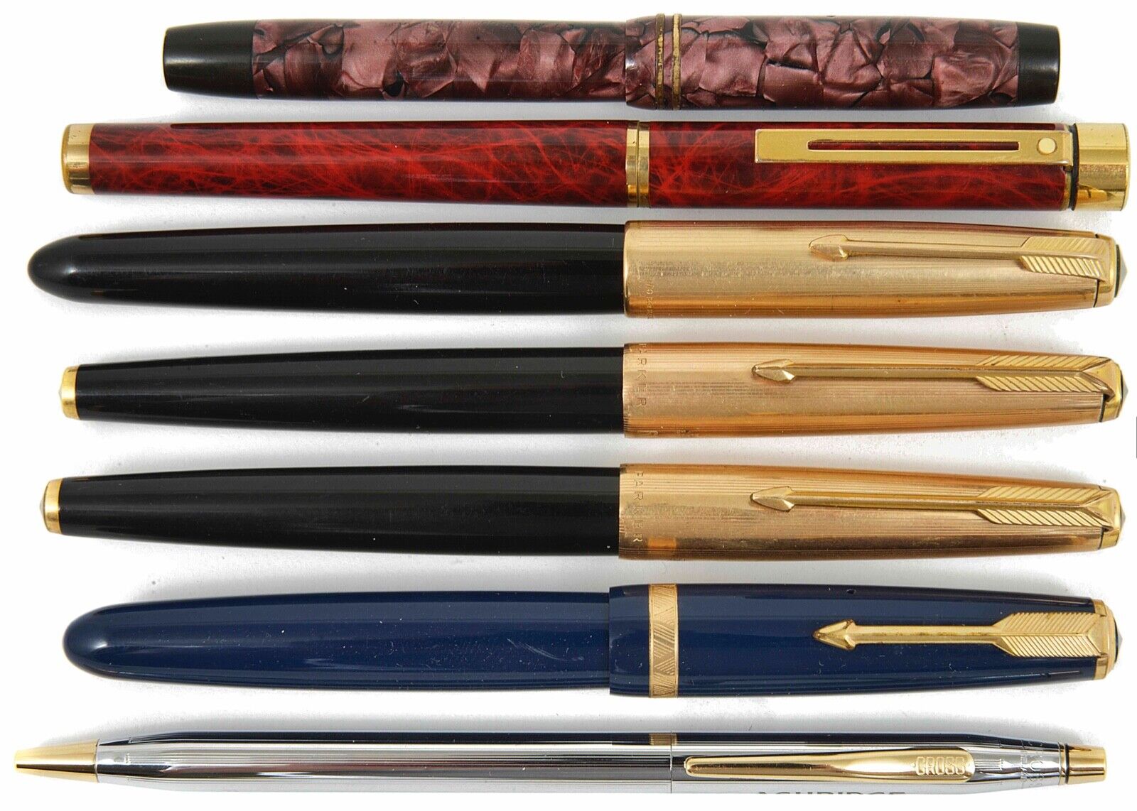 A collection of 7 fountain pens and others: Sheaffers, Parkers and Cross