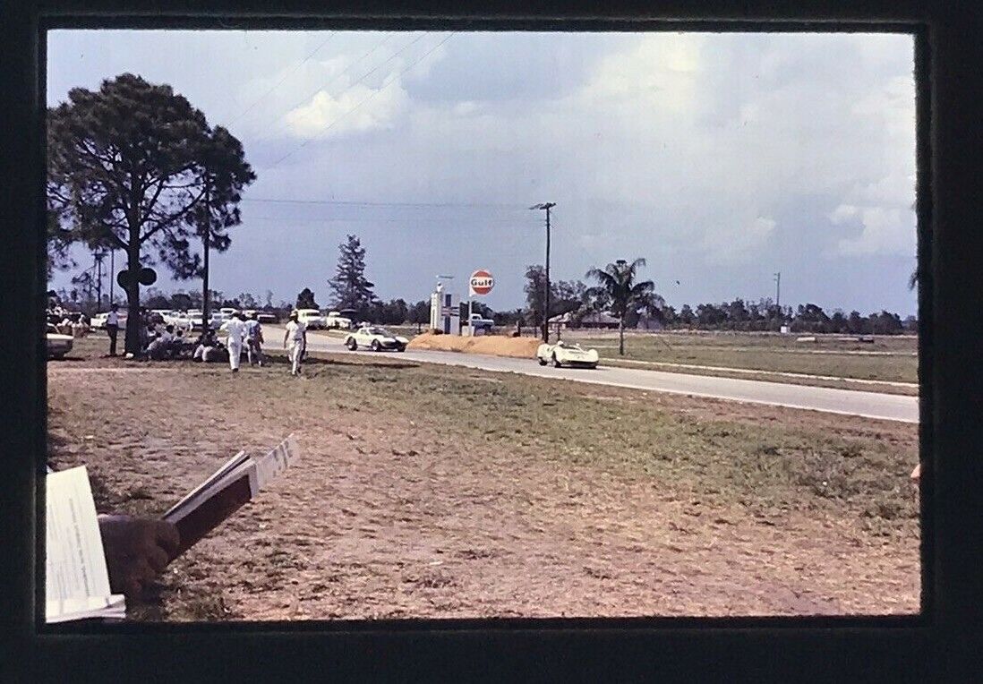 1960\'s Sebring FL 12 hour 1965 Race two white cars making turn