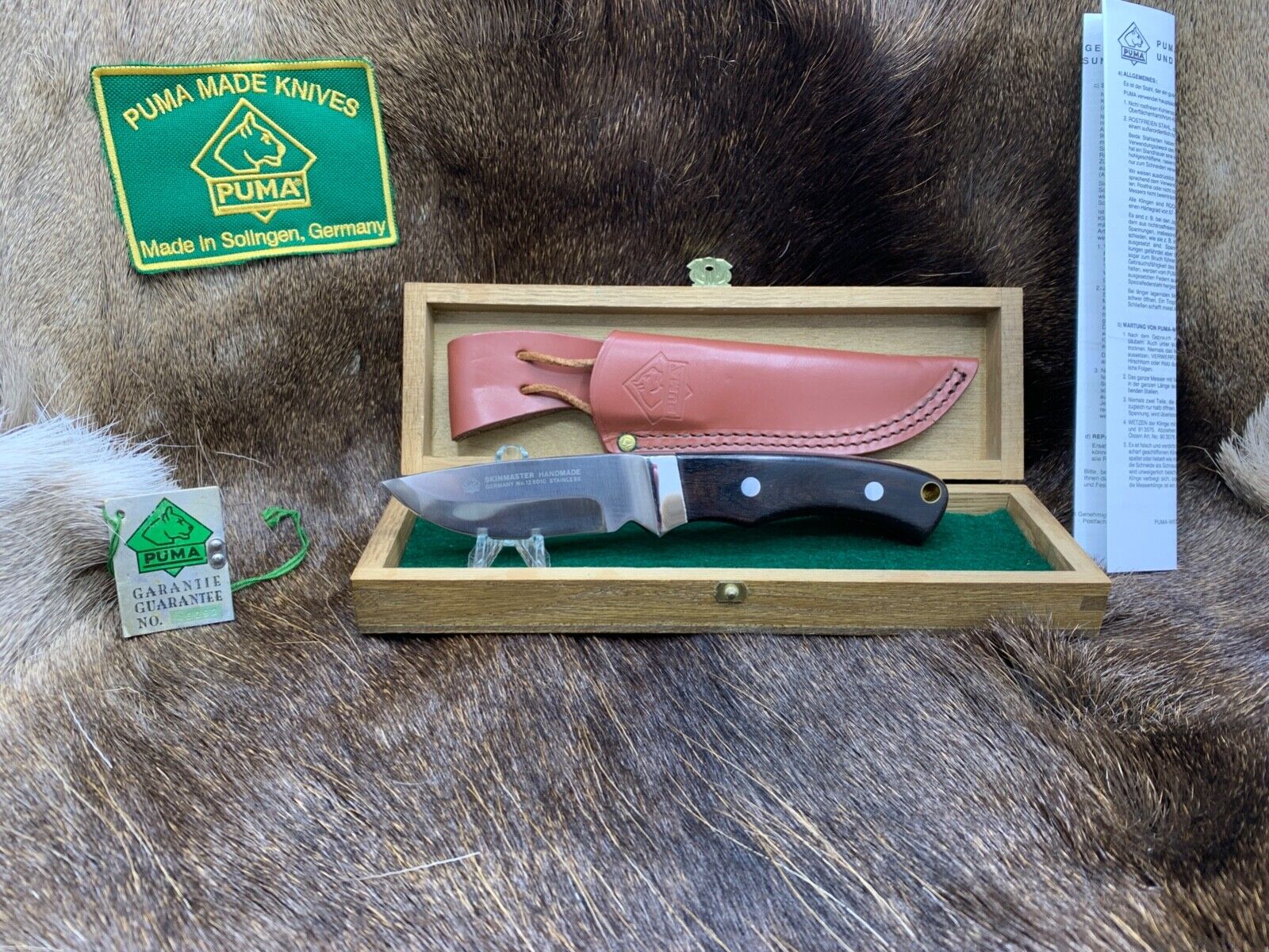 Puma 126010 Skinmaster Knife With Grenadill Handles & Leather Sheath Mint In Box