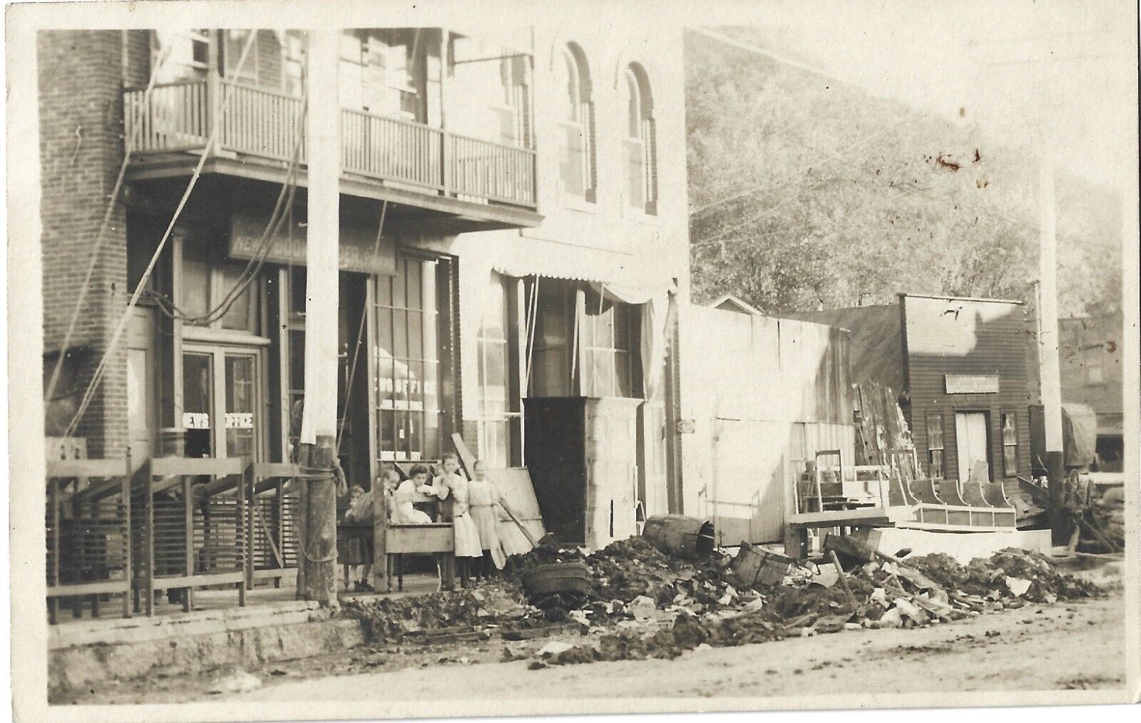McGregor IA 1908 flood--Debris in front of newspaper office; nice 1908 RPPC