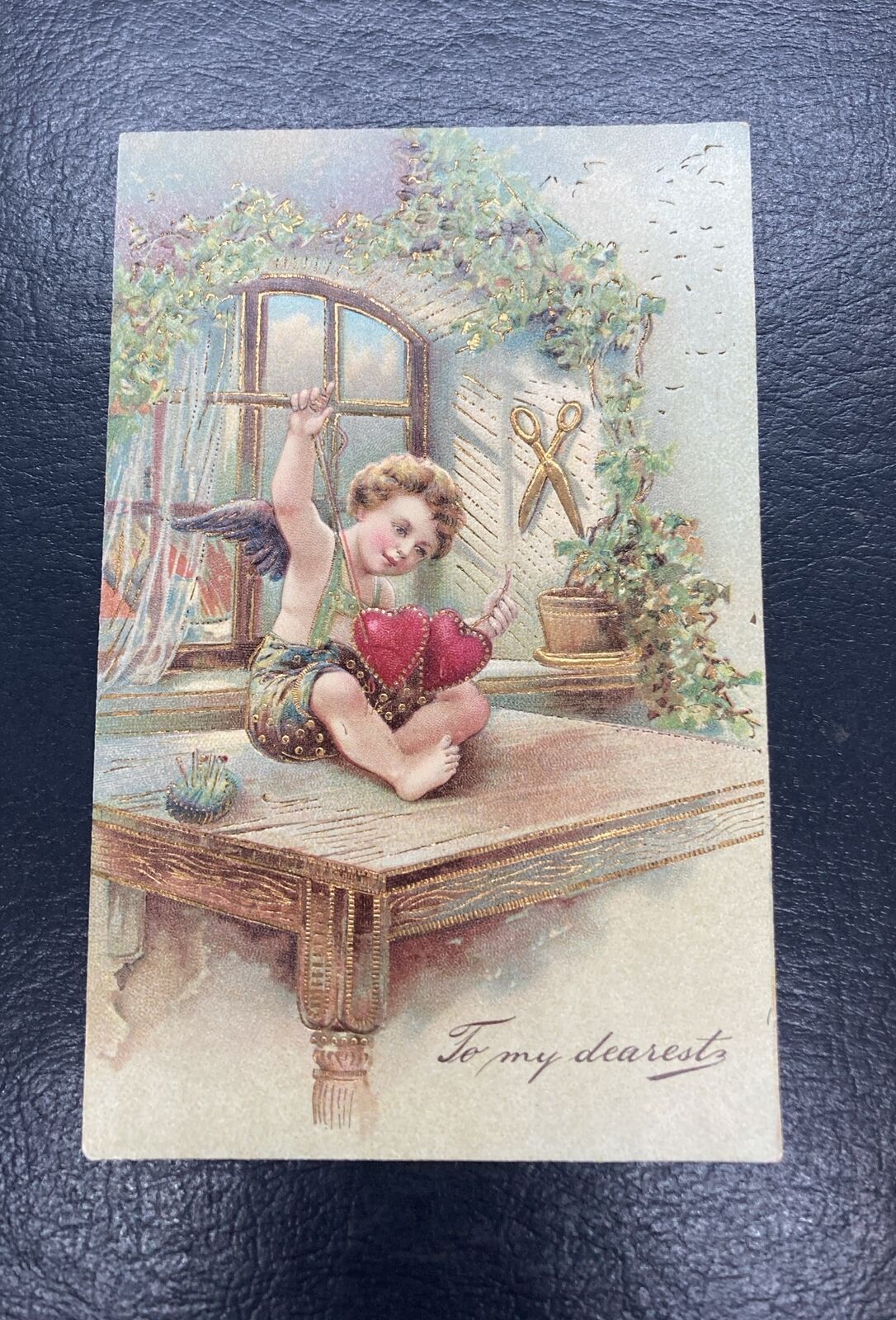1907 Valentine Angel Stitching Hearts Big Scissors Embossed Postcard