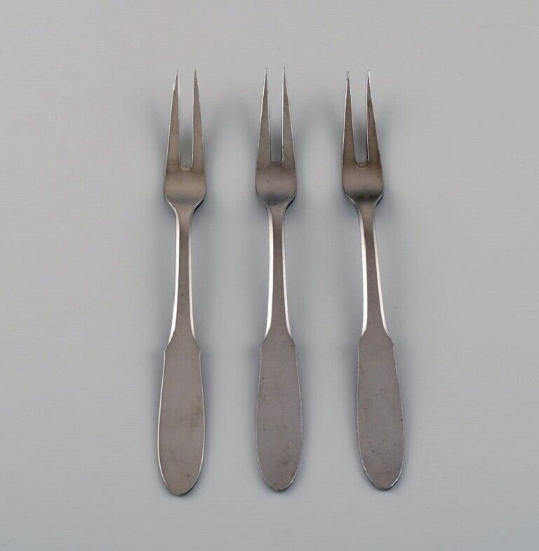 Gundorph Albertus for Georg Jensen. Three Mitra cold meat forks.