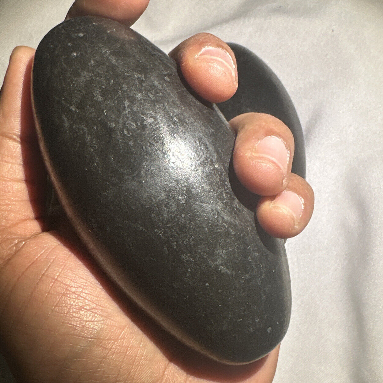 4” Black Shiva Lingam stone from Narmada River, India - Palm size Shiva - 1 pc