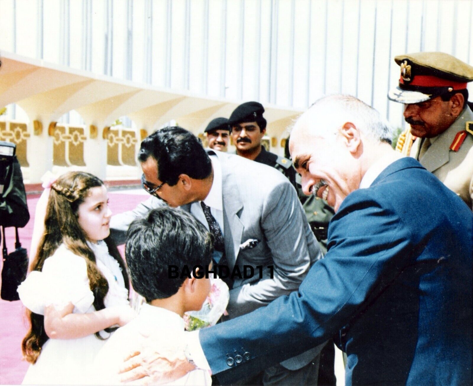 Iraq. Reprinted photo of Saddam  and King Hussain ben Talal,  1980s.   PZ1-1-3