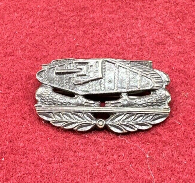 WWI US Army Tank officer branch insignia pin pin-back marked Solid Fire Bronze.