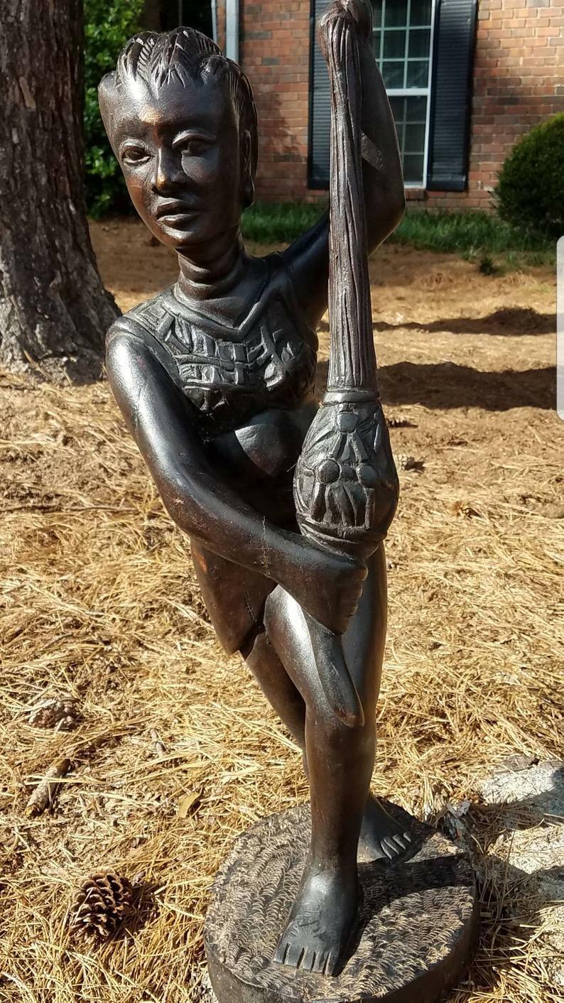 Woman Playing the Shekere Sculpture