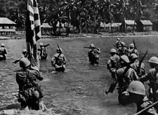 Japanese Marines wade ashore a Pacific island from their assault c- 1944 Photo picture