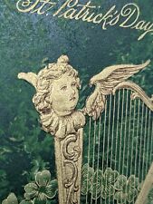 St Patrick's Day Gold Harp with Face Surrounded by Embossed Shamrocks Postcard picture
