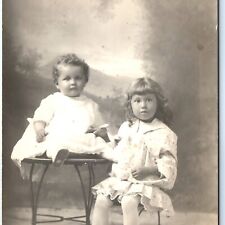 c1910s Adorable Siblings RPPC Baby Boy in Dress Cute Little Girl Real Photo A144 picture