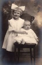 RPPC Happy Lil Girl w Big Hair Bow & Cute Baby Vintage Real Photo Postcard c1905 picture